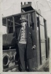  Joseph Alexander Skinner standing by the wheelhouse on the motor barge GOTHIC. He was Captain and along with the Mate, lost his life when the GOTHIC capsized off Dover December 1937.  IA003992